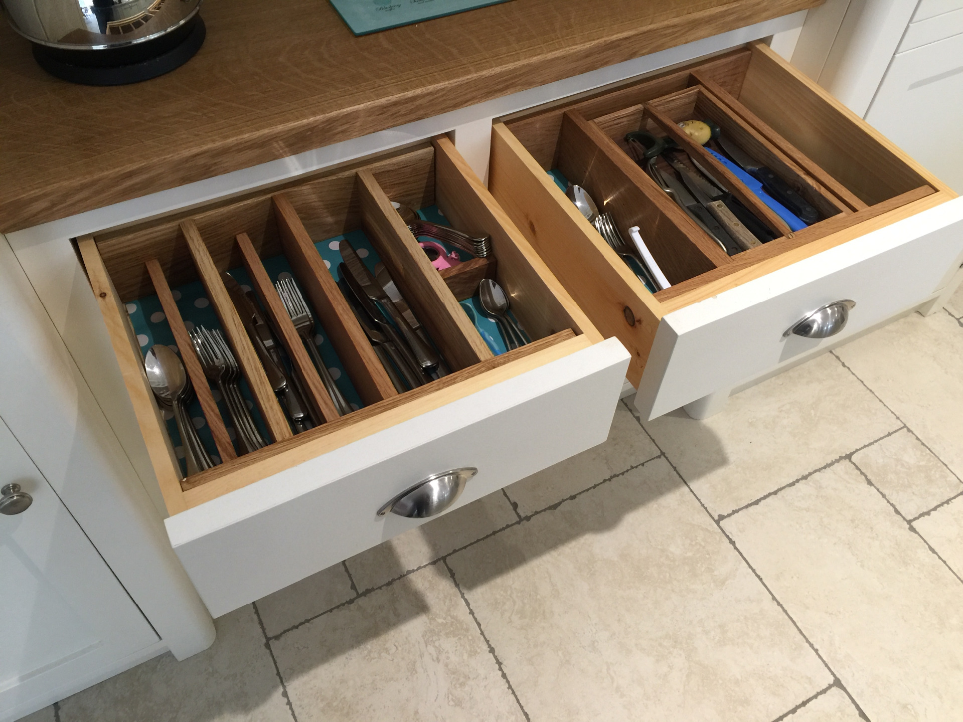 Individually tailored drawer inserts from solid oak.