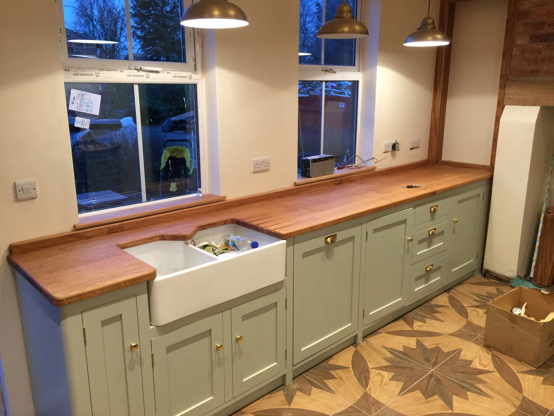 Fully bespoke solid wood shaker style fitted kitchen.Individually tailored island site with solid black walnut top.