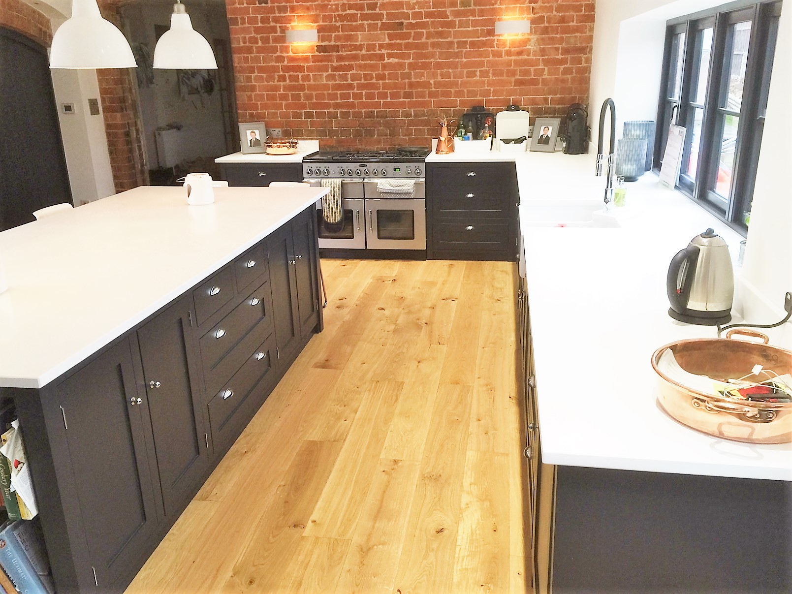 Individually tailored solid wood shaker style kitchen with double belfast sink hand built from solid wood in Nottingham.