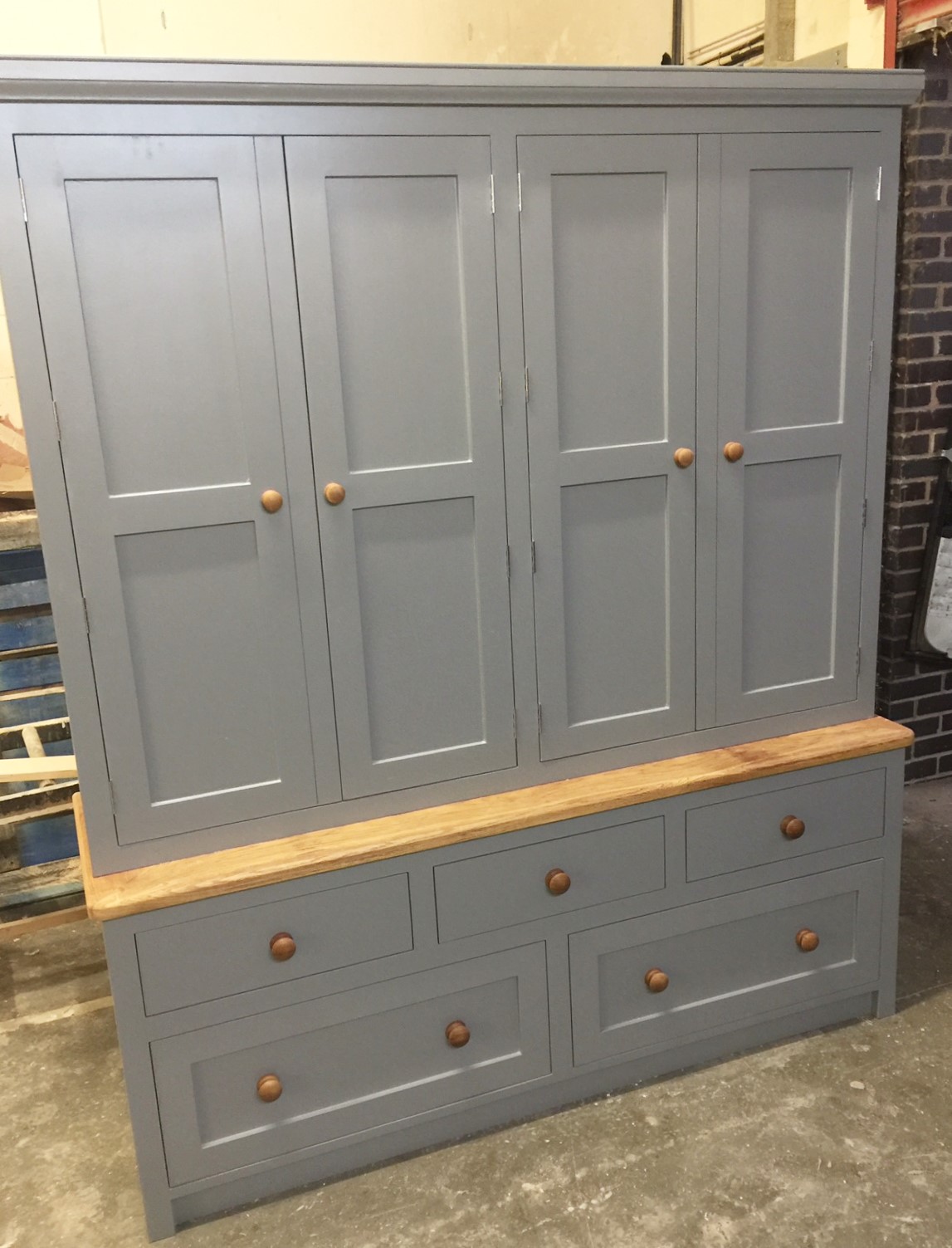 Fully bespoke wall cabinet hand built from solid wood at our factory in Nottingham.